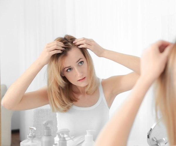 woman-hair-loss woman-hair-loss